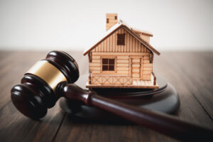 a wooden house and a gavel